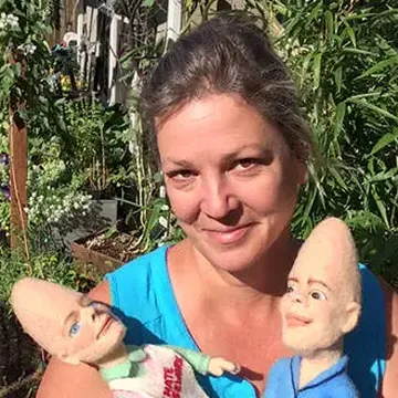 Kay Petal of Felt Alive with two needle-felted wool dolls